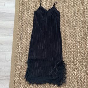 Never worn, new black slip on dress